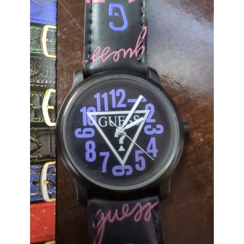 Rare vintage 90s Guess watch with original case and paperwork.